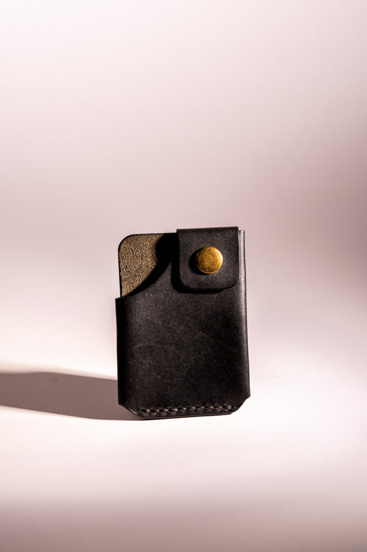 Black leather wallet with gold button 
